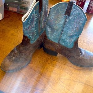 Womens cowgirl boots. Very well broken in, still have lots of miles left.